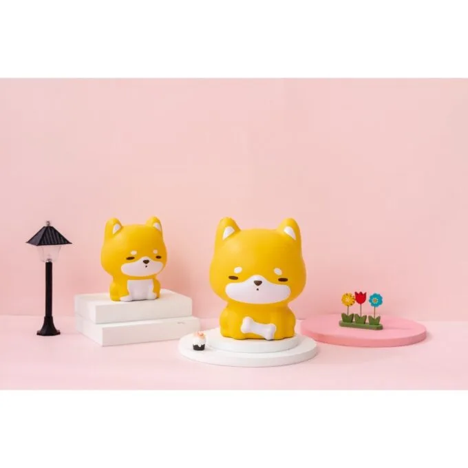 SQUISHY DOLL IN NET DOG DESIGN — image 1